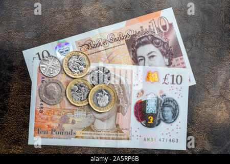 United Kingdom - Sterling pounds bank notes and coins Stock Photo