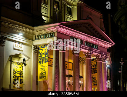 Lyceum Theatre lit up at night with The Lion King musical banner, Wellington Street, London, England, UK Stock Photo
