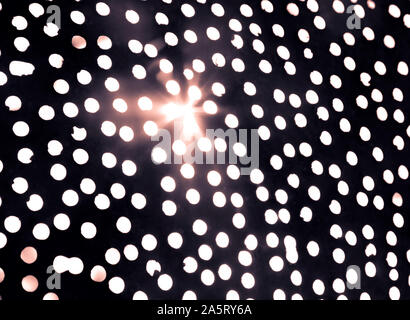 close up texture of sun light and metal dot background , abstract seamless texture. Stock Photo