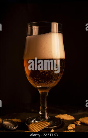 Half glass of beer. Stock Photo
