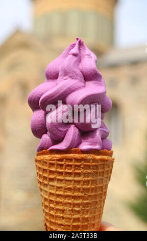 Vertical Image of Georgian Wine Soft Serve Ice Cream Cone Stock Photo