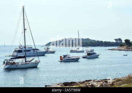 Rovinj, Croatia, August 24: the Yachts of the residents of Rovinj are parked in a quiet cozy Bay near the red island, August 24, 2019. Stock Photo