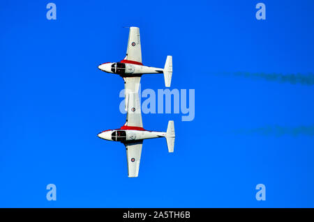 Two members of the Canadian Forces 431 Air Demonstration squadron flying in formation at an air show in 2019 over the Nanaimo harbour on Vancouver Isl Stock Photo