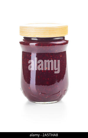 Raspberry jam in jar isolated on white background. Stock Photo