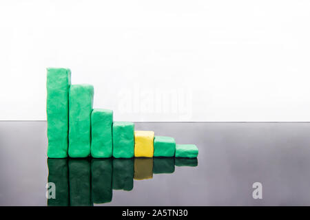 Growing business concept. Graph of success in 2020 year. Graph Bars made from Play Clay. Stock Photo
