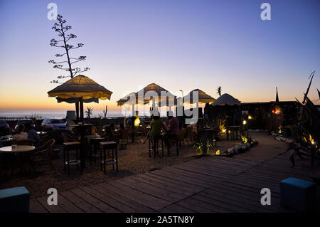 Sunset in the chill out terrace of El Dorado beach club at El Palmar Beach  (El Palmar de Vejer, Cádiz, Andalusia, Spain Stock Photo - Alamy