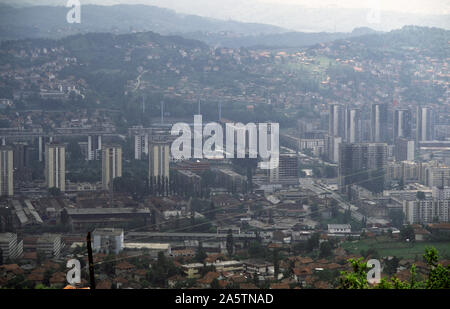 6th June 1993 During the Siege of Sarajevo: the view due-south from Hum Hill towards Grbavica Stadium and the little red-roofed houses on the hills of Vraca. Stock Photo
