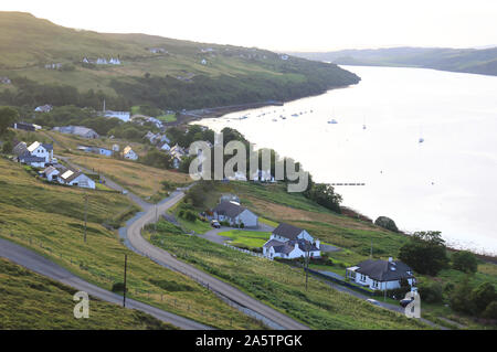 View over Carbost on Loch Harport, at sunset, on the Isle of Skye, in the Inner Hebrides, in Scotland, in the UK Stock Photo