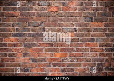 Colorful brick wall in England. Stock Photo