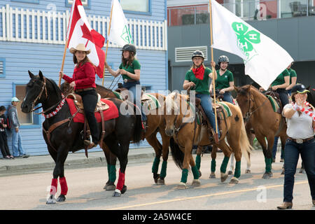 Members of the 4-H Club ride horseback during the Canada Day Parade held on July 01, 2019 in Whitehorse, Yukon Territory, Canada. Stock Photo