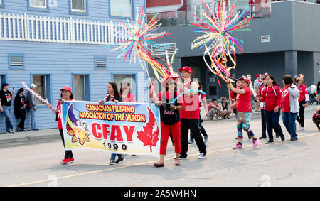 Members of the Canadian Filipino Association (CFAY) take part in the 2019 Canada Day Parade held in Whitehorse, Yukon, Canada. Stock Photo
