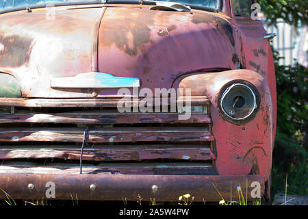 Close up isolated view of an old abandoned rusting pickup truck. Stock Photo
