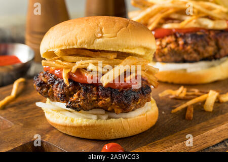 Homemade Cuban Fritas Hamburger with Fries and Chorizo Stock Photo