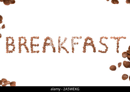 Breakfast word made by chocolate cereals isolated on white background Stock Photo