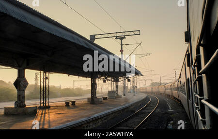 Slowly passing through,looking from a glassless 2nd class sleeper carriage window on a journey from Mysore to Pondicherry. Stock Photo