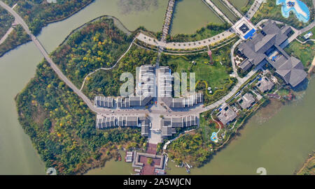 Jiangsu, Jiangsu, China. 23rd Oct, 2019. Jiangsu, CHINA-Aerial photo taken on Oct. 20, 2019 shows the beautiful autumn colors of Pananhu national wetland park in Xuzhou, east China'sJiangsu province.As the first wetland park for ecological restoration of coal mine subsidence area in China, Pan 'an lake national wetland park was once the largest and most serious coal mining subsidence area in Xuzhou. Credit: SIPA Asia/ZUMA Wire/Alamy Live News Stock Photo