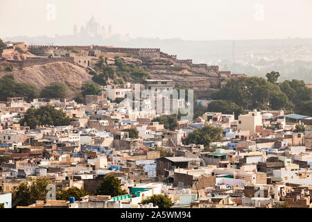 Looking across the city of Jodhpur, Rajasthan, India. I don't remember what that fort / palace was in the distance but it certainly looked impressive Stock Photo
