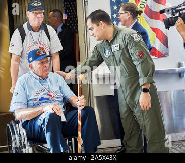 Arlington, VA, USA - September 21, 2019: WWII veterans arriving off an American Airlines honor flight at Ronald Reagan National Airport. They are gree Stock Photo