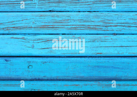 The surface of the nailed boards painted in blue. Background picture Stock Photo