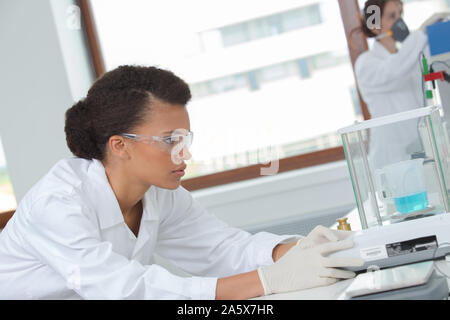 female researcher doing research in a lab Stock Photo