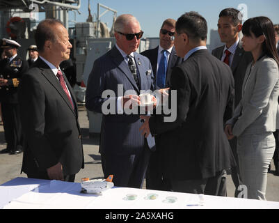 The Prince of Wales with representatives of groups tackling ocean plastics and climate change during a visit to HMS Enterprise, which is moored at Harumi Pier in Tokyo, Japan. Stock Photo