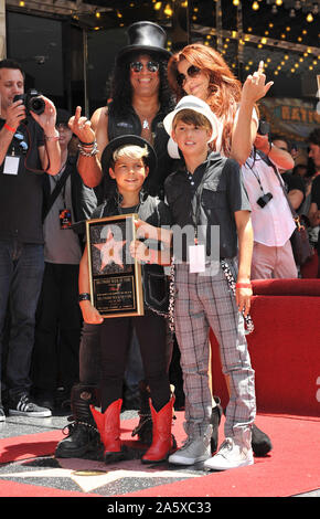 LOS ANGELES, CA. July 10, 2012: Rock guitarist Slash & sons & wife Perla Ferrar on Hollywood Blvd where he was honored with a star on the Hollywood Walk of Fame. © 2012 Paul Smith / Featureflash Stock Photo