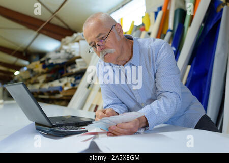packaging design profession looking at colors choices Stock Photo