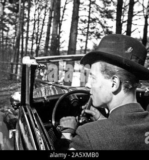 Eva Braun Photo Collection - Album 1 -  German man wearing hat driving car ca. 1930s Stock Photo