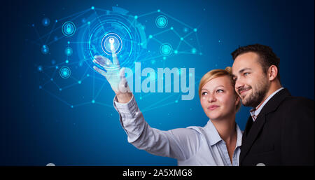 Man touching hologram screen displaying keys and locks Stock Photo