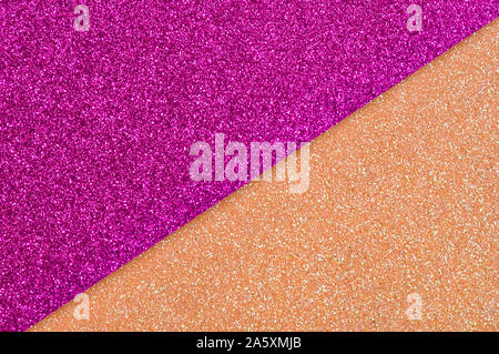 Shiny multicolored festive background. Multicolor paper diagonal background pink, orange colors. Top view, copy space. Stock Photo