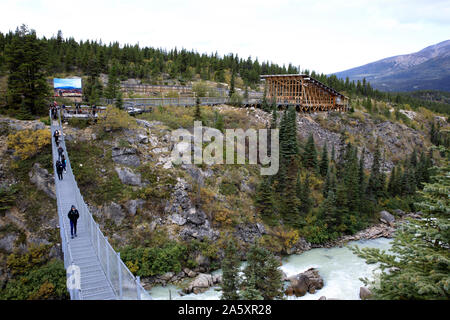 Yukon landscape and suspension bridge, Yukon, Canada, USA Stock Photo