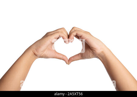 Close up the hand of the woman making a heart from two hands. Open the palm of the hand isolated on the white background. The human showing shape for Stock Photo