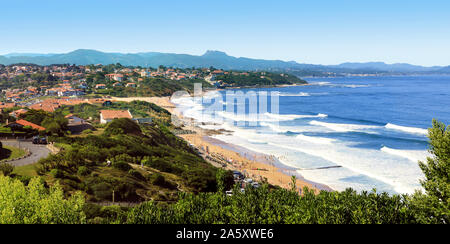 The beach and the waves of the ocean on the Basque coast . Stock Photo