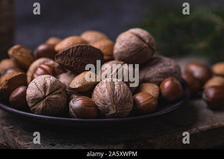 Pine Nuts On A Brown Textured Background, Close Up Stock Photo - Alamy