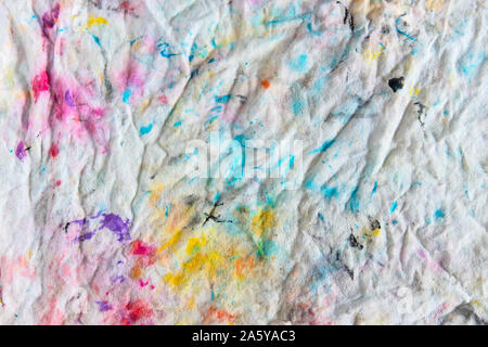 color stained cloth texture, background image dirty rag due to the cleaning of the brushes Stock Photo