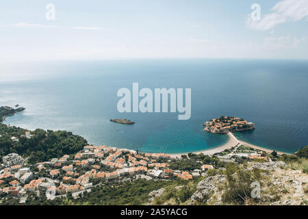 Beautiful view of the sea, the coastal city and the island of Sveti Stefan in Montenegro. Stock Photo