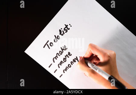 Writing to do list. Motivation list. Text TO DO list on paper. Stock Photo