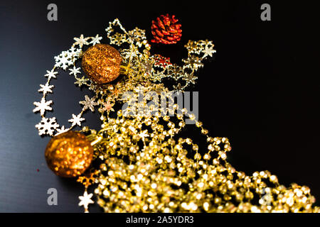 Christmas decorations on wooden board. Christmas concept. Colorful and glittery balls and garlands. Stock Photo