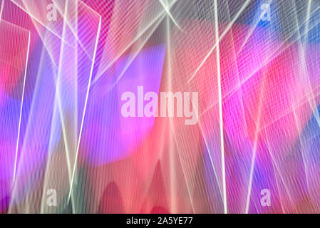 Abstract background with neon lights in fast motion blur and coloured futuristic frame concept. Digital design and empty copy space for Editor's text.