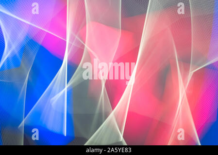 Abstract background with neon lights in fast motion blur and coloured futuristic frame concept. Digital design and empty copy space for Editor's text.