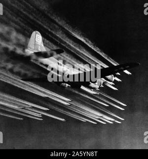B-17 US air force flying fortress aircraft with escort fighters over Germany 1945 World War II Stock Photo