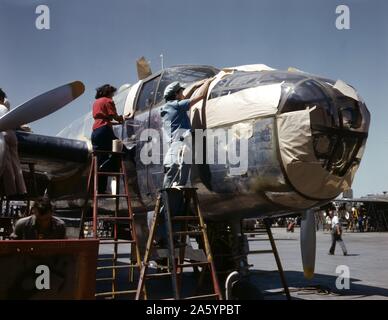 Colour photograph of a Second World War, North American B-25 bomber being prepped for painting at the North American Aviation, Inc. Photographed by Alfred T. Palmer (1903-1993) best known for his photographs depicting Americana during World War II, as he became an Office of War Information photographer. Dated 1942 Stock Photo