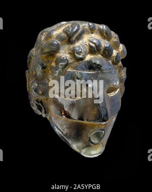 Gold painted glass wall fountain mask by Henri Edouard Navarre (1885-1971) French artist who primarily works with glass. Dated 1937 Stock Photo