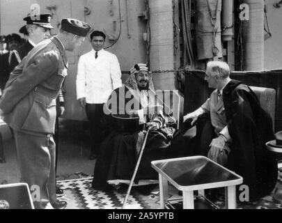 Franklin D. Roosevelt and King Ibn Saud of Saudi Arabia at Great Bitter Lake in Egypt. Record creator Franklin Delano Roosevelt, (1882-1945). Date 14 February 1945. Stock Photo