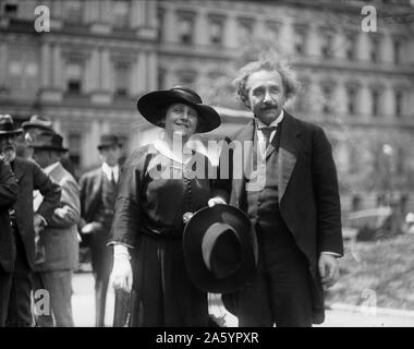 Albert Einstein with his wife Elsa, State, War, and Navy building in background, Washington DC. Photographer Harris and Ewing. 1921 and 1923. Stock Photo