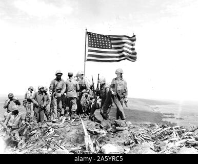 Battle of Iwo Jima. Photo taken during flag raising on volcano top. Stock Photo