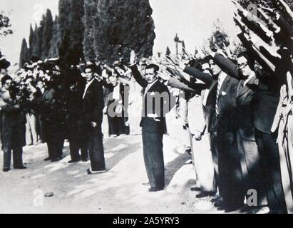 Falange salute is offered to the coffin of the assassinated José Calvo Sotelo, 1st Duke of Calvo Sotelo (1893 – 1936). Spanish politician prior to and during the Second Spanish Republic. His murder by a unit of the urban police force known as the Assault Guard and several socialist (PSOE/UGT) activists contributed greatly to precipitate the Spanish Civil War, Stock Photo