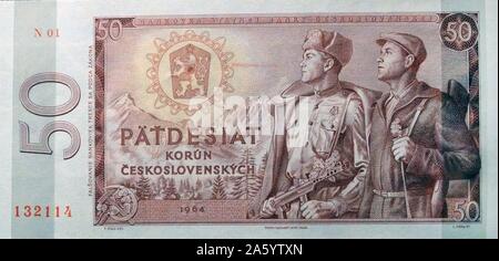 50 Korun banknote; issued in the Czechoslovak Socialist Republic in the 1960s show workers, soldiers and industrial buildings. These images were used to suggest progress, military strength and well-being. Stock Photo