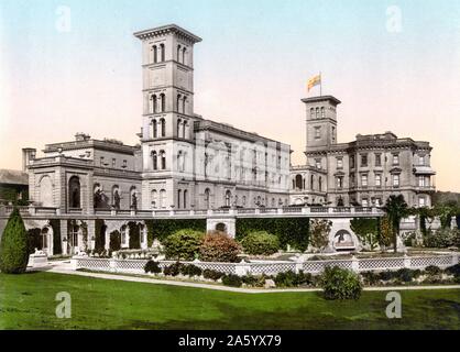 Osborne House, Isle of Wight, England 1890. Osborne House is a former royal residence in East Cowes, Isle of Wight, UK. The house was built between 1845 and 1851 for Queen Victoria and Prince Albert as a summer home and rural retreat. Prince Albert designed the house himself in the style of an Italian Renaissance palazzo. The builder was Thomas Cubitt, the London architect and builder whose company built the main façade of Buckingham Palace Stock Photo