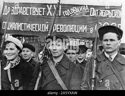 Photograph of Factory workers drilling with guns in their free time in the USSR. Dated 1940 Stock Photo
